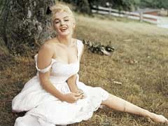 Marilyn Monroe's Personal Belongings, Including A Card From Her Father, To Be Auctioned