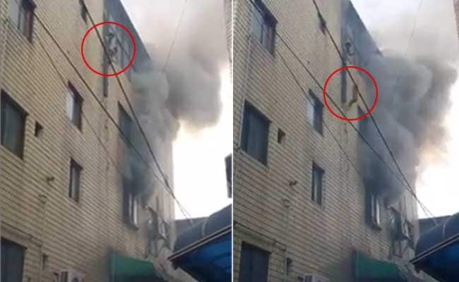 Terrifying Moment Mom Throws Kids Out of Burning Building in South Korea