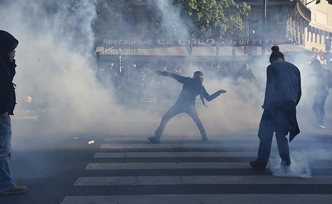 Hooded Protesters Clash With Police In Paris Over Labour Law