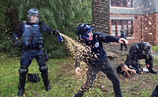 Australia Police Uses Pepper Spray To Break Up Clashes In Melbourne