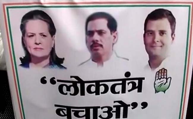लोकतंत्र बचाओ रैली : सोनिया-राहुल गांधी के साथ कांग्रेस के पोस्टर में क्यों दिखे 'दामाद' रॉबर्ट वाड्रा
