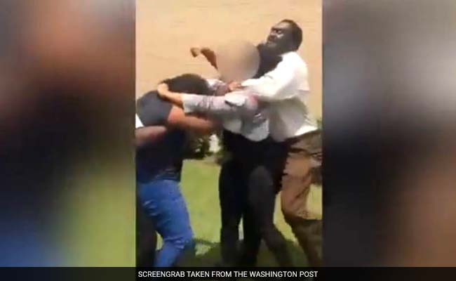 'She Out!' Video Shows Student Lose Consciousness In School Official's Choke Hold