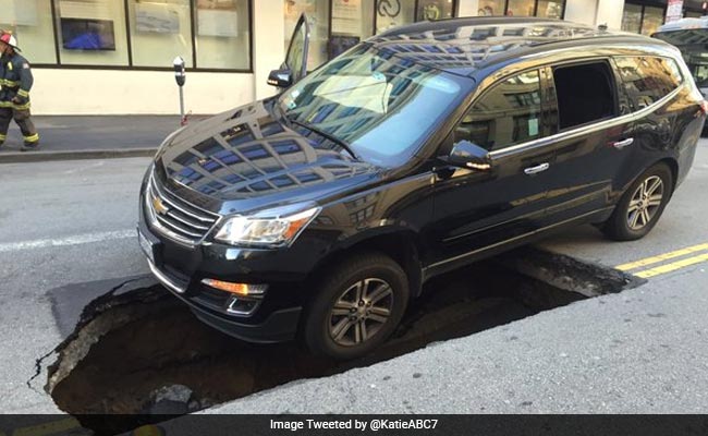 Stuff of Nightmares, This: Car Gets Stuck in Sinkhole in San Francisco