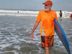 India's 'Surfing Swami' Preaches The Virtues Of The Perfect Wave Repeating