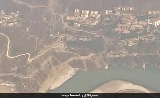 Indian Air Force Chopper Sprinkles Water To Douse Uttarakhand Forest Fires