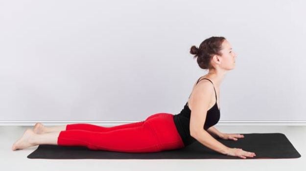 How to Do Bhujangasana (The Cobra Pose): Steps and Benefits - NDTV Food