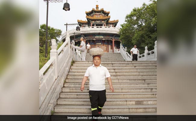 Why This Chinese Man Walked Around With 40 Kg Block Of Cement On His Head