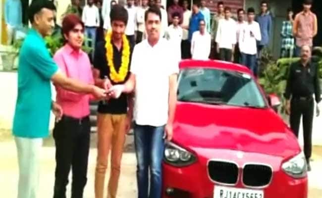 Some Reward This. JEE Topper Gifted BMW by Rajasthan Coaching Institute