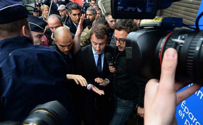 Angry Workers Lob Eggs At French Economy Minister Emmanuel Macron