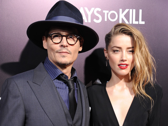 Amber Heard Calls Police as Johnny Depp Retrieves His Items