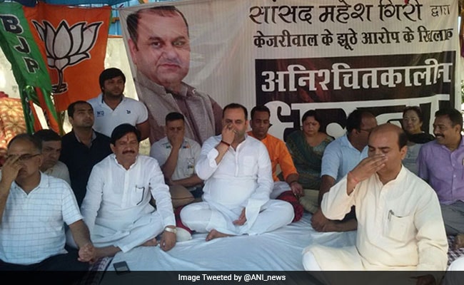 On Yoga Day, BJP Lawmaker's 'Protest Asana' Outside Arvind Kejriwal's Home