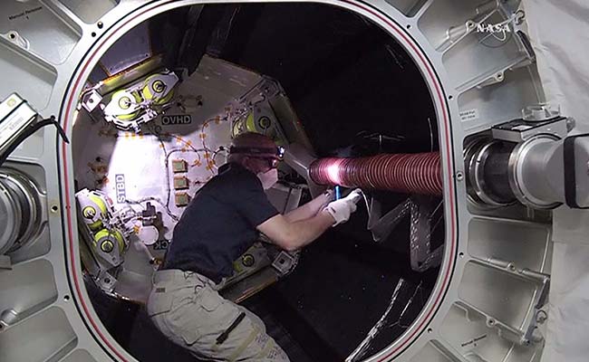 Astronauts Enter Inflatable Room At Space Station