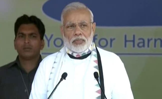 PM Modi Obliges People With Selfies At International Yoga Day Celebrations