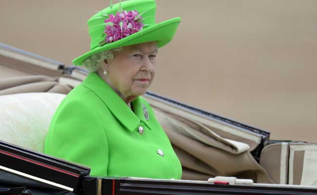 Britain's Queen Elizabeth II Wows In Green At 90th Birthday Parade