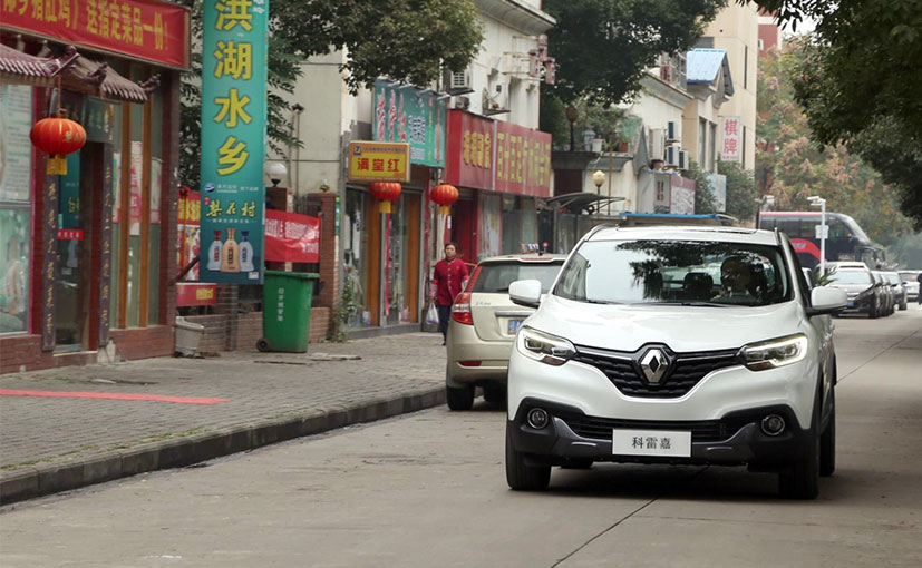 China Might Lift Restriction on Foreign Carmakers' Stakes in Joint Ventures