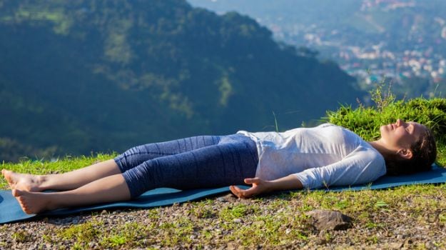 The benefits of Legs up the wall pose - Ekhart Yoga