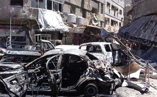 Suicide Bombers Kill 20 Outside Syria Shrine: Report