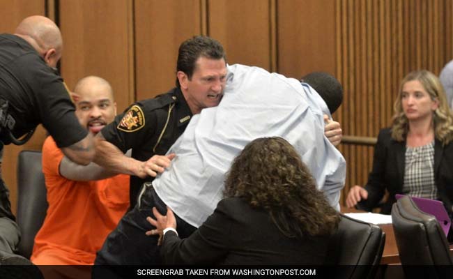 'He Mutilated My Child,' Says Father Who Attacked Grinning Serial Killer In Court