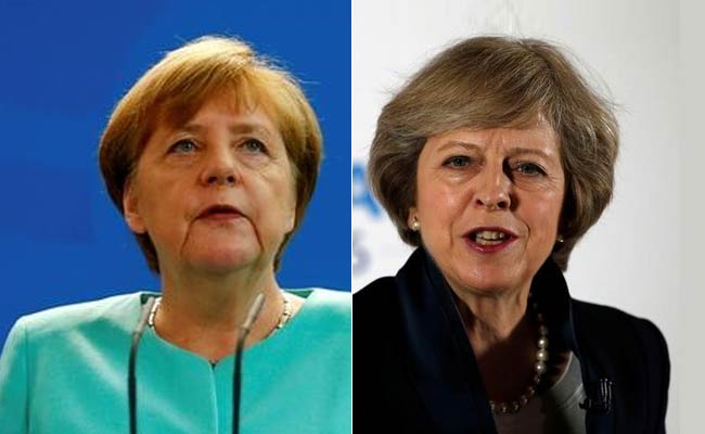 Europe In Their Hands: Theresa May, Angela Merkel Draw Battle Lines For Brexit Clash