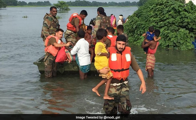 Army Jawans On Rescue Mission In Flood-Hit Assam, Bihar