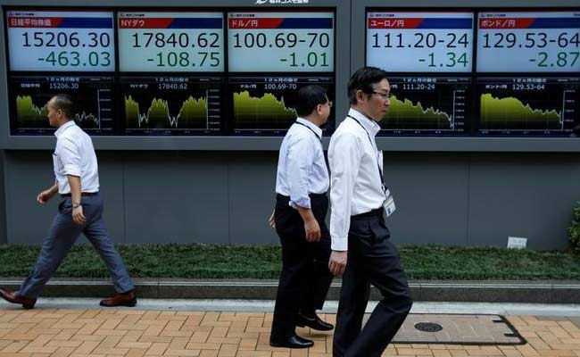 Asian Shares Gain Nearly 0.5% On Bank Of England Easing Boon