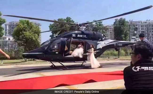 Bride and Groom Hold Up Traffic to Board Helicopter on Busy Road