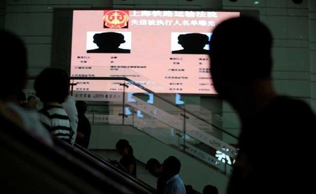 China Uses Public Billboards To Shame Runaway Debtors