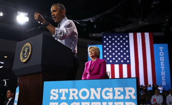 'I Believe In Hillary Clinton,' Barack Obama Tells Voters