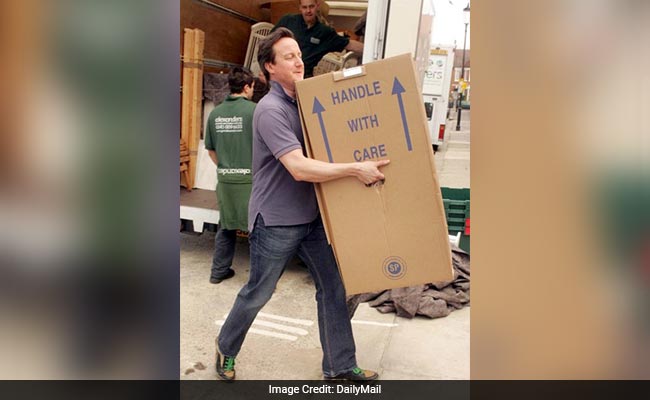 The Real Story Behind Viral Pic of David Cameron Moving House