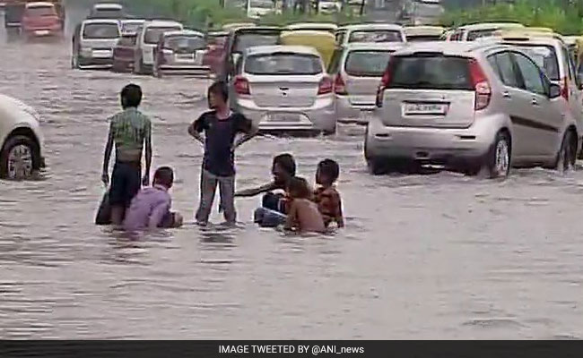 Continuous Downpour In Delhi Slows Traffic