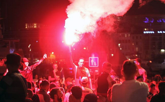 Police Use Tear Gas On Champs Elysees After France Win