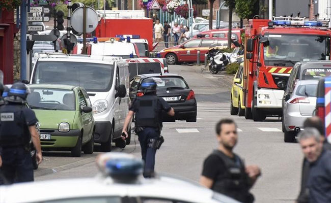 Teen Who Killed French Priest Buried In Family Crypt Outside Paris