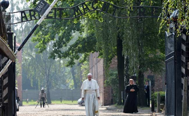 Pope Francis Walks Alone Through Horrors Of Auschwitz
