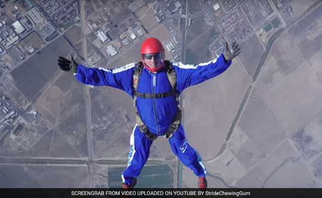 He's A Skydiver Working With A Net But No Parachute