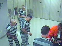 Watch: Inmates Break Out Of Jail To Save Guard's Life