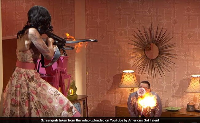 Stunt Gone Wrong. Flaming Arrow Hits Performer's Neck On Reality TV Show