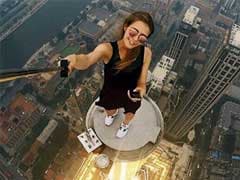 This Woman's Dizzying 'Rooftopping' Pics Are Both Brilliant And Scary