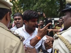 Police Cane ABVP Activists At Amnesty Office In Bengaluru