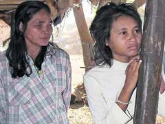 Cambodia's 'Jungle Woman' Returned To Vietnamese Father