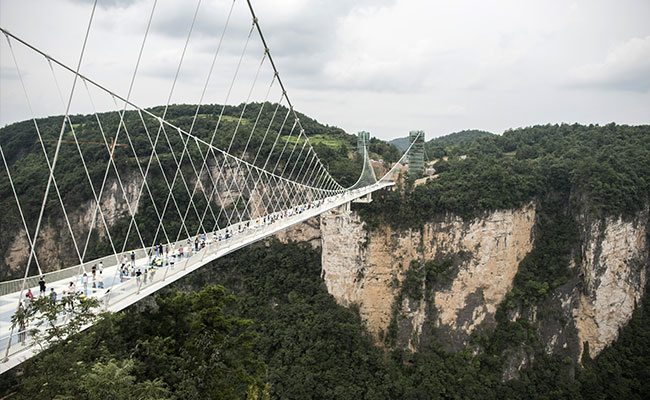 China Opens World's Highest And Longest Glass Bridge