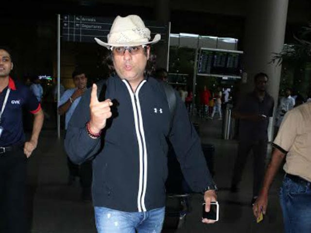 Fardeen Khan Doesn't Look Too Happy to be Photographed, Does He?