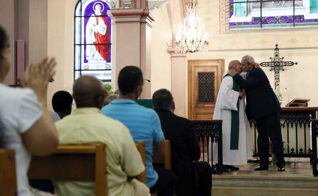 Muslims Pray With Catholics Over Priest's 'Barbaric' Murder