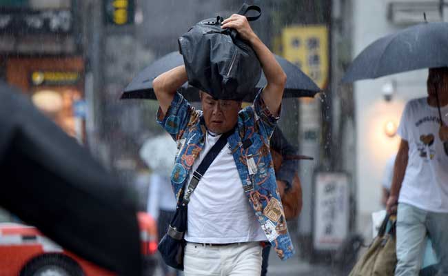 People Face Distress As Typhoon Hits Near Tokyo