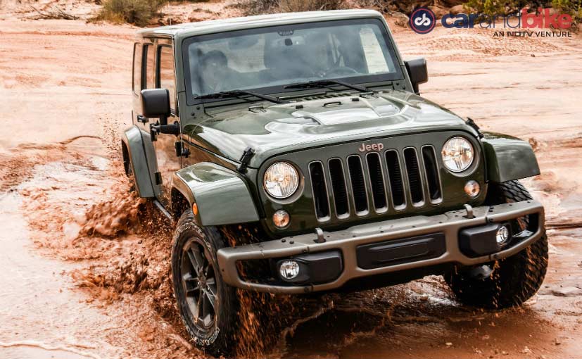 Jeep Wrangler Unlimited Powering Away Through Mud and Slush 