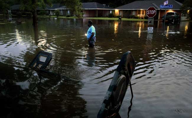 Underfire Barack Obama Heads To Flood-Hit Louisiana