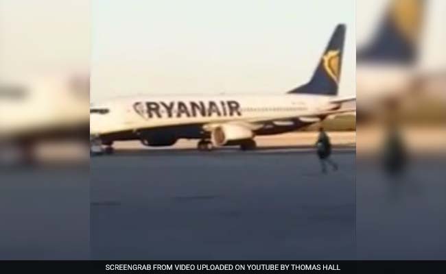 Wait up! Video Of Man Chasing After Plane On Runway Goes Viral