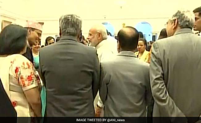 PM Modi, T S Thakur Display Bonhomie At President's 'At Home'