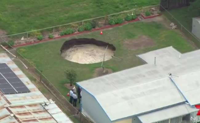 Australian Couple Wakes Up to Find Giant Sinkhole in Backyard