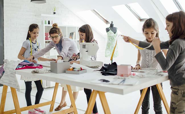 Classroom Standing Desks May Help Kids Slim Down: Study