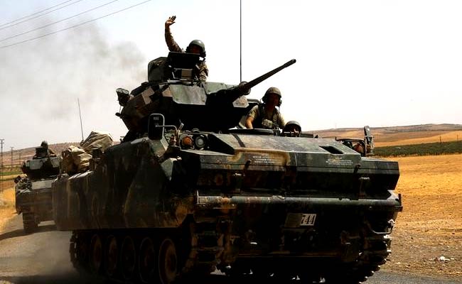 Turkey Ratchets Up Syria Offensive, Says Warplanes Hit Kurdish Militia